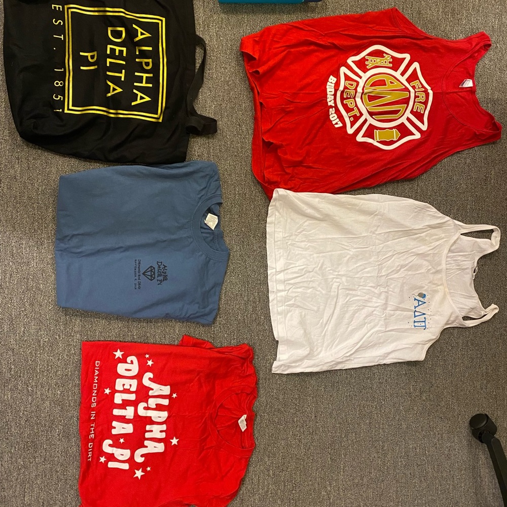 Alpha Delta Pi t-shirts, blanket, towel and water bottle.
